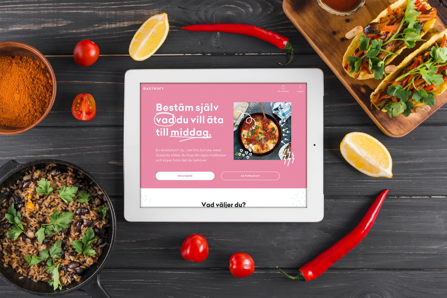 Gastrofy på en ipad i köket med mat runtom